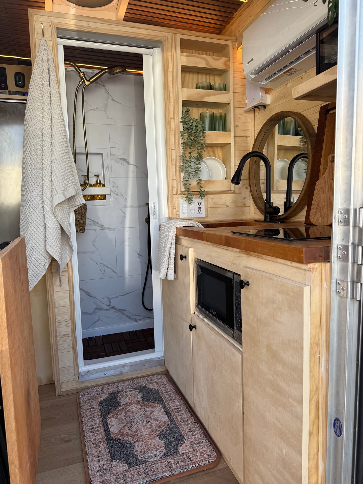 Wanderwell cargo trailer kitchen and shower interior
